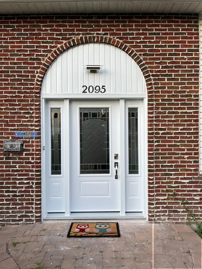 Arched entry door after installation