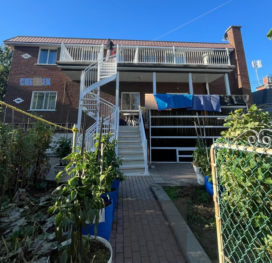 Staircase, balcony, and aluminum awning before installation