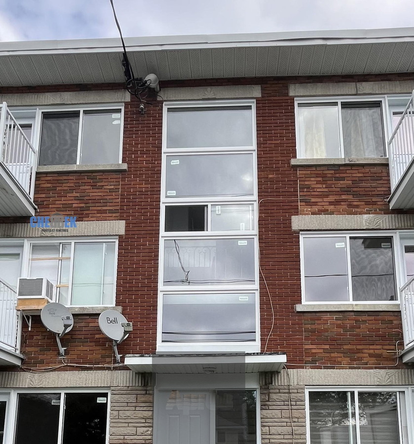 Apartment building windows after replacement